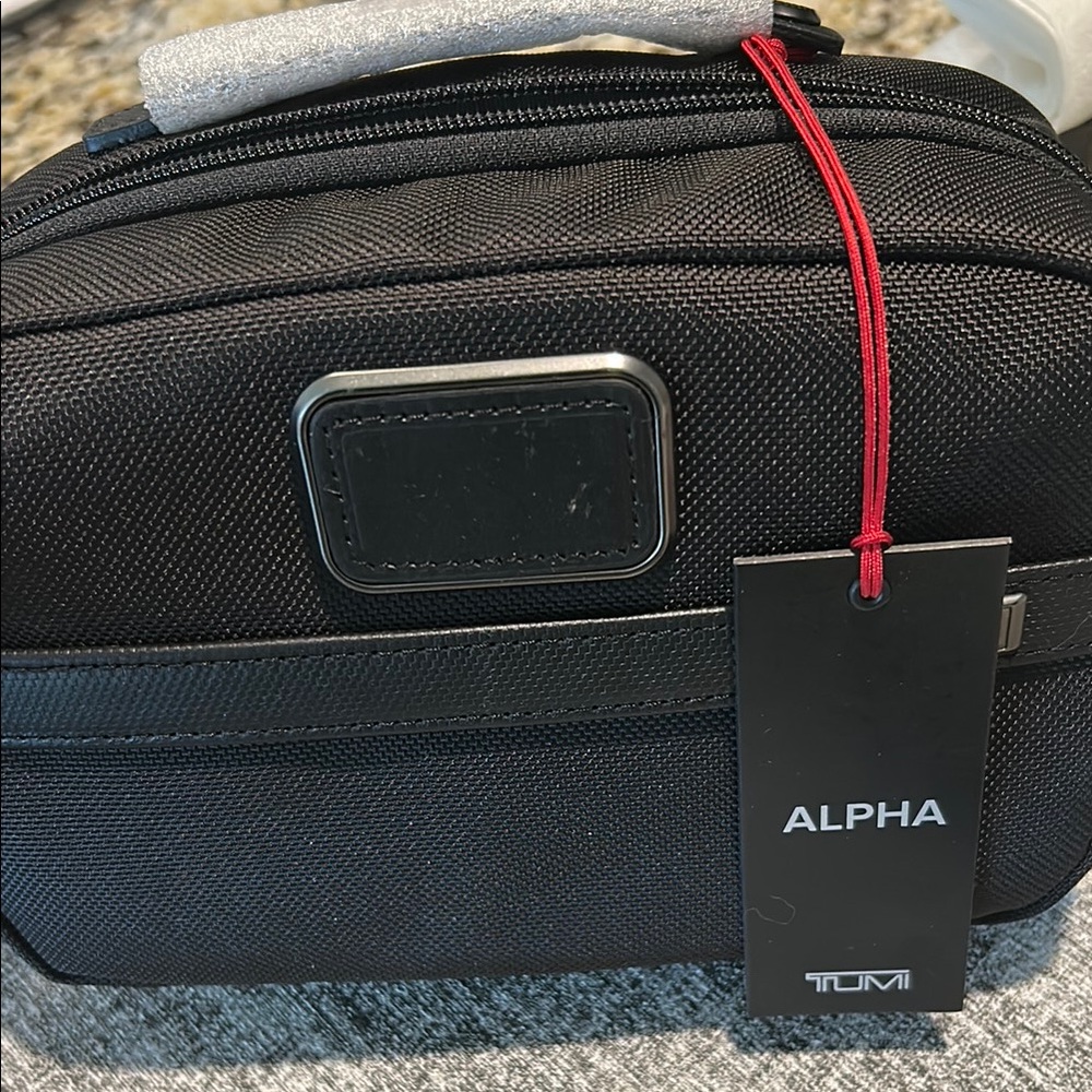 Tumi Black Belt Bag with Durable Design